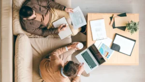 Two creative interface designers developing brand new software for smartphones