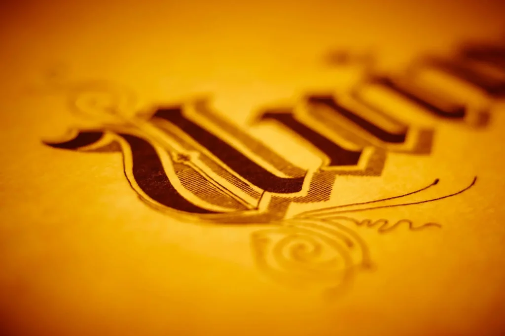 Antique typography in warm tone. Retro design text. Ornament letter